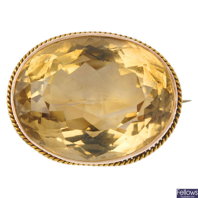An early 20th century 9ct gold citrine single-stone brooch.