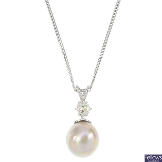 A natural pearl and diamond pendant.