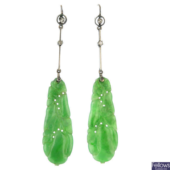 A pair of jade and diamond ear pendants.