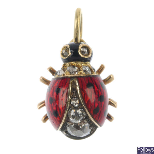 A late 19th century enamel and diamond ladybird pendant.