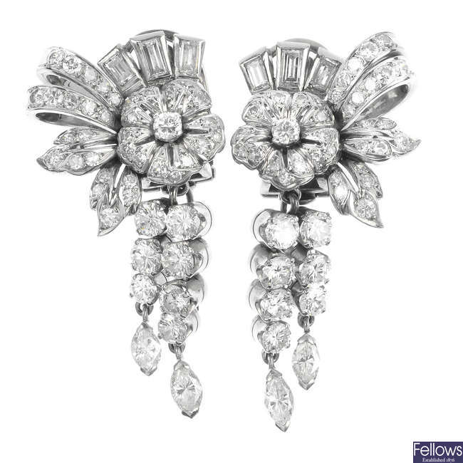 A pair of diamond foliate ear clips.