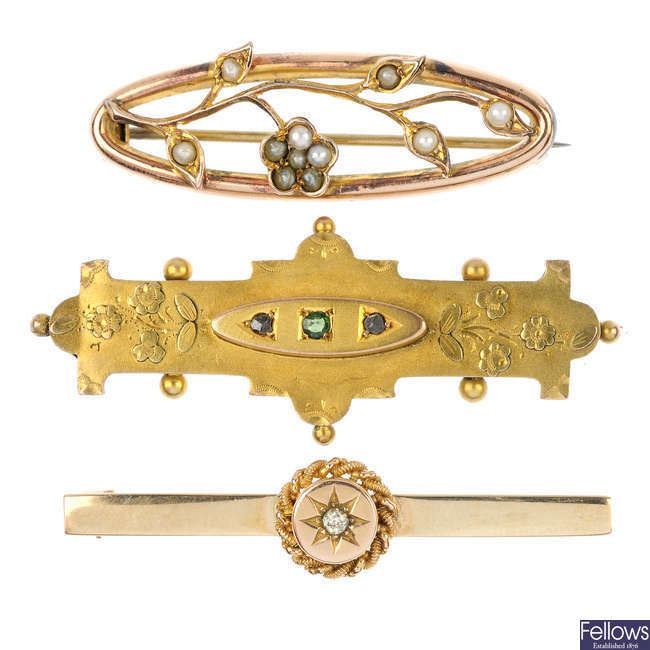 A selection of three diamond and gem-set bar brooches. 