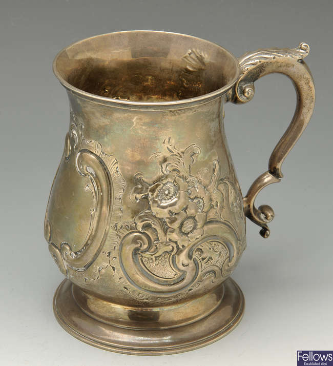 A Victorian silver mug.