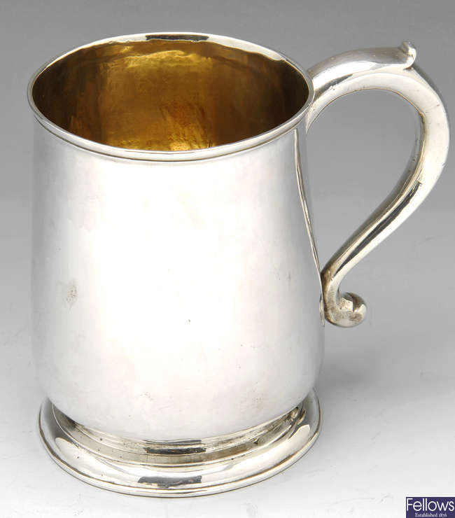 A George II & George III silver mugs (2).