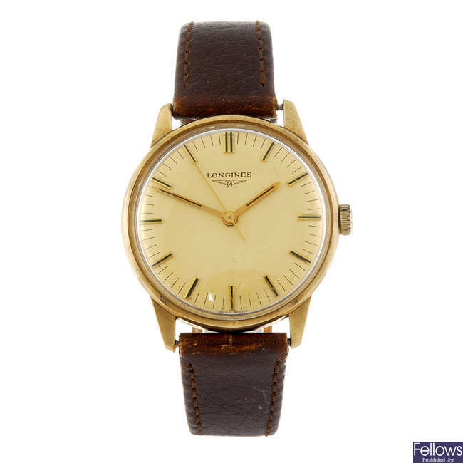 LONGINES - a gentleman's 9ct gold wrist watch.