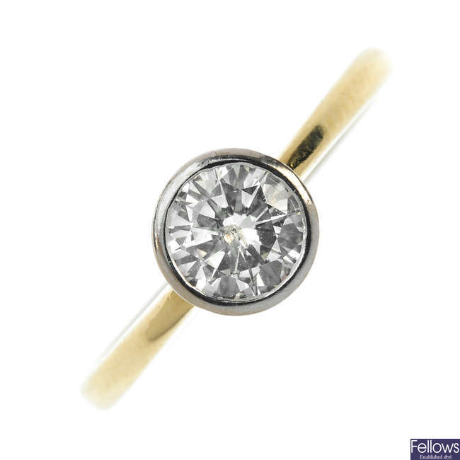 An 18ct gold diamond single-stone ring. 