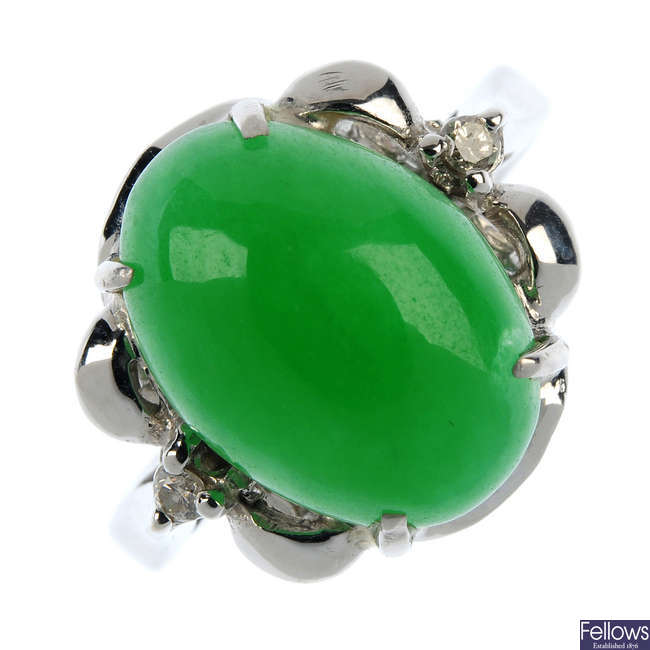 A jade and diamond dress ring.