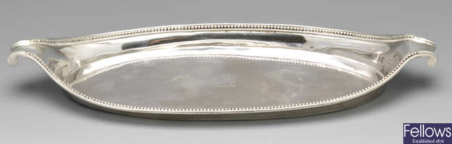 A George III silver snuffer tray.