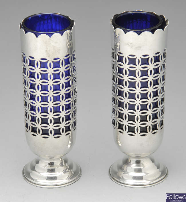 A pair of late Victorian silver bud vases.