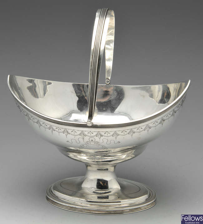 A George III silver sugar basket. 