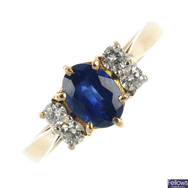 A 9ct gold sapphire and diamond ring.