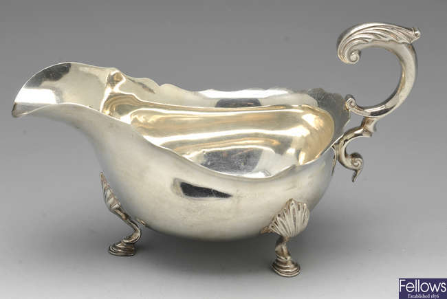 Two silver sauce boats.