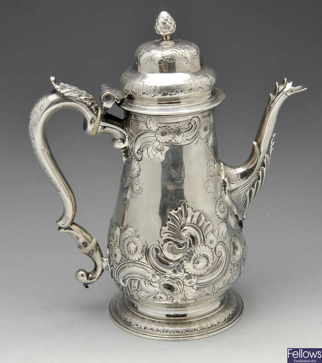 A George III silver coffee pot. 
