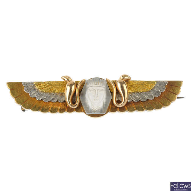 An early 20th century Egyptian Revival gem-set brooch.