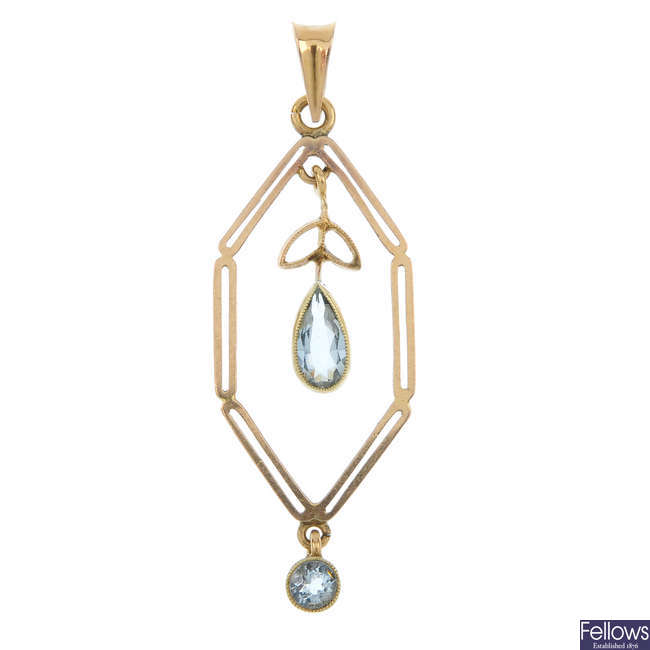 An early 20th century gold aquamarine pendant.