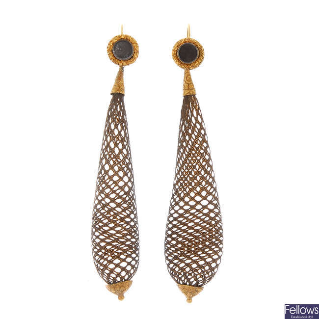 A pair of late 19th century gold ear pendants.