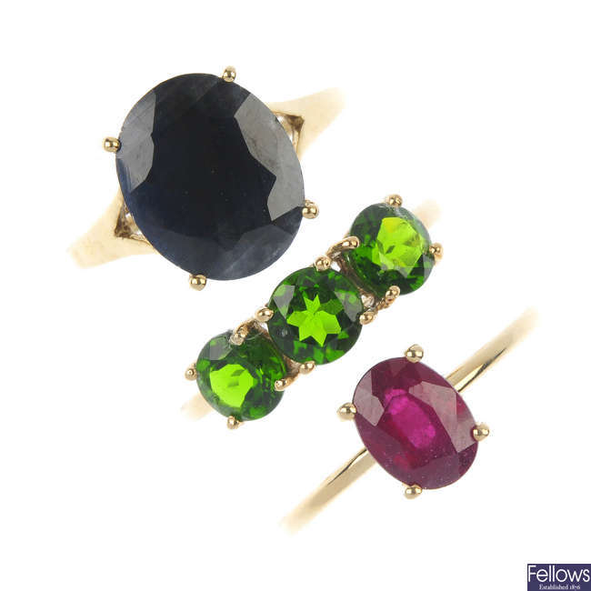 A selection of five 9ct gold diamond and gem-set dress rings.