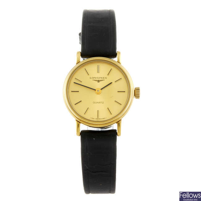LONGINES - a lady's gold plated wrist watch together with a lady's Rotary bracelet watch.