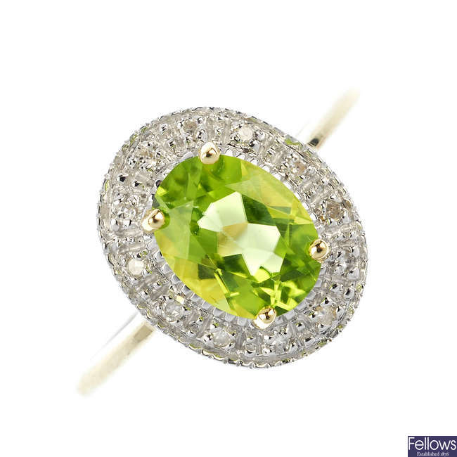 A 9ct gold peridot and diamond cluster ring.