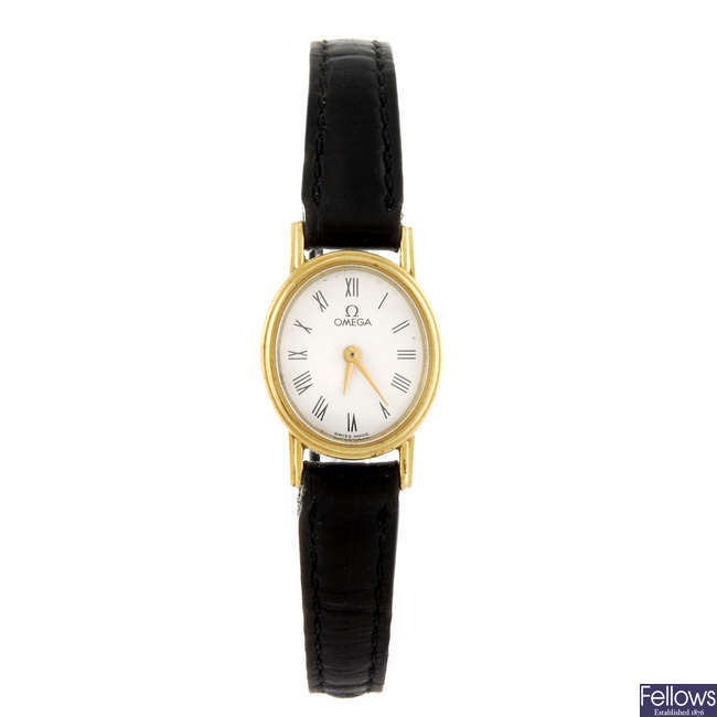 OMEGA - a 9ct gold lady's wrist watch.