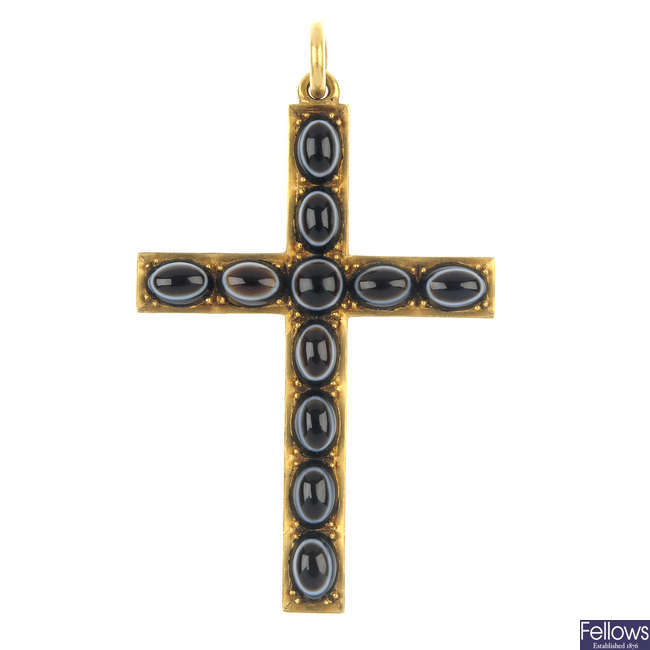 A mid 19th century 21ct gold agate cross pendant.