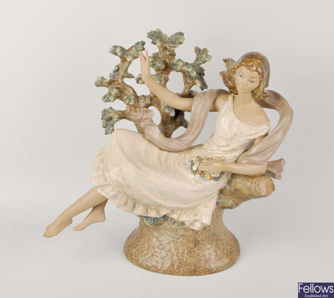A large Lladro figure of a young girl