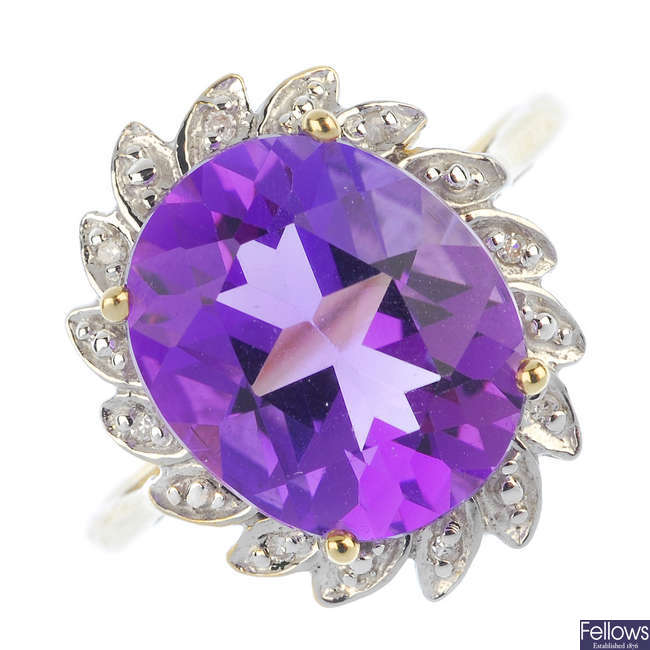 A 9ct gold amethyst and diamond cluster ring.