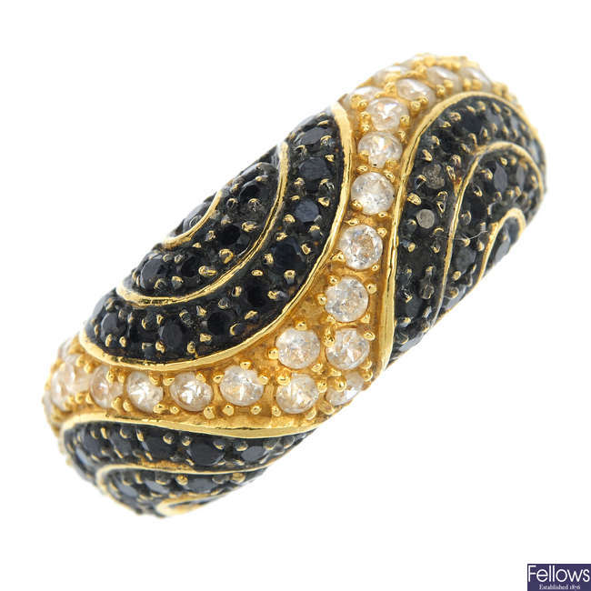 A gem-set dress ring.
