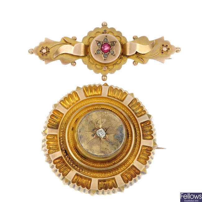 Two late 20th and early 19th century gold, diamond and synthetic ruby brooches.