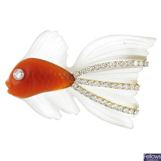 A diamond, carnelian and rock crystal fish brooch.