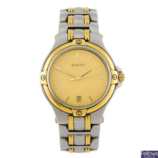 GUCCI - a gentleman's bi-colour 9040M bracelet watch and a gentleman's Bulova wrist watch.