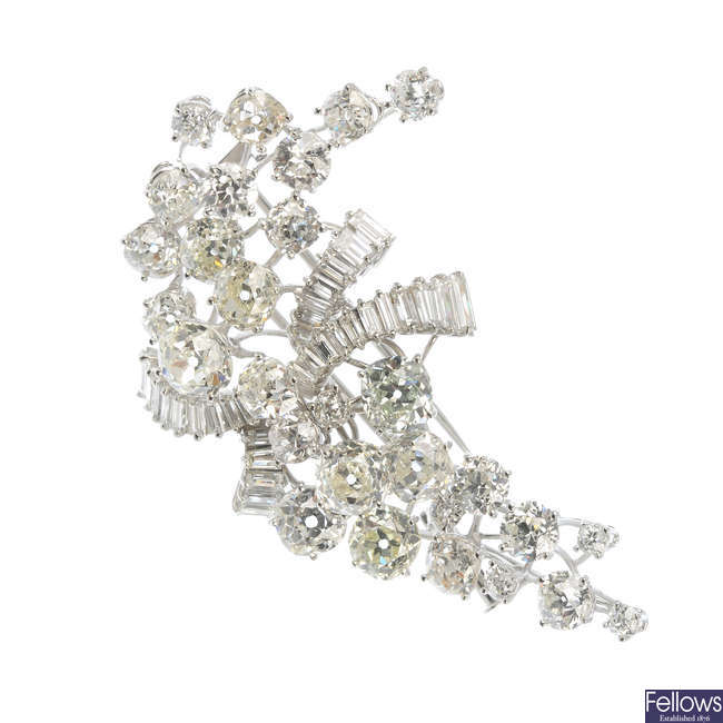 LOT:200 | A diamond floral spray brooch.