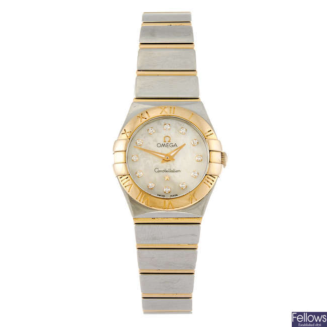 OMEGA - a lady's bi-metal Constellation bracelet watch.