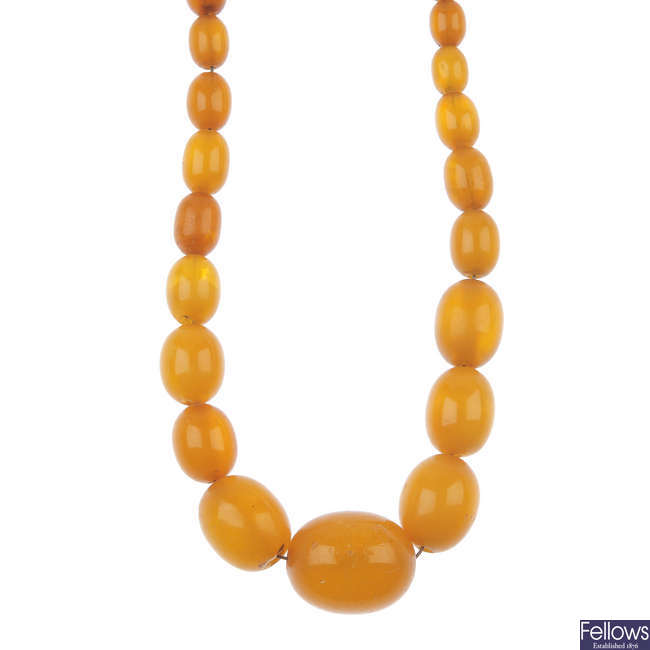 A natural amber bead single-row necklace.