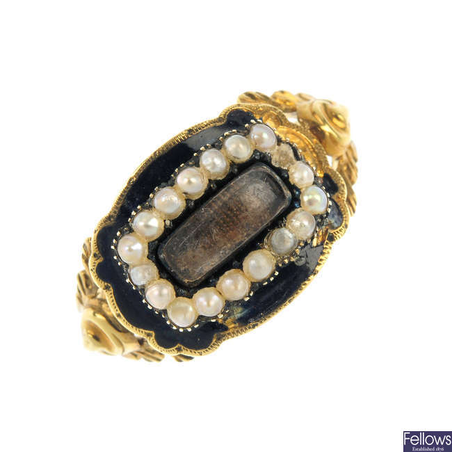 An early 19th century 18ct gold, enamel and split pearl memorial ring.