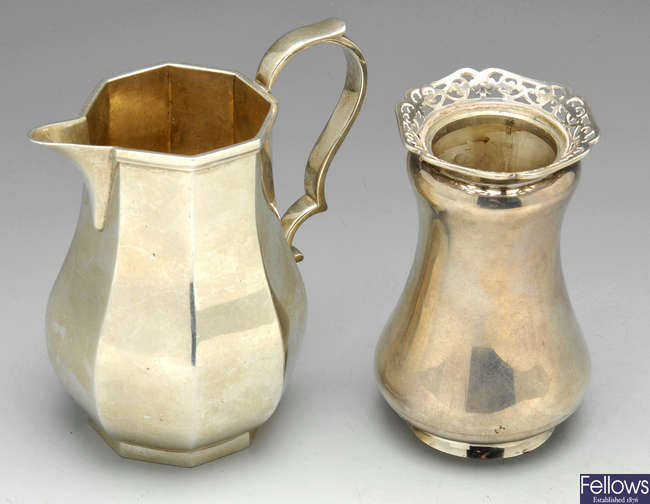 A modern silver cream jug & early 20th century vase.