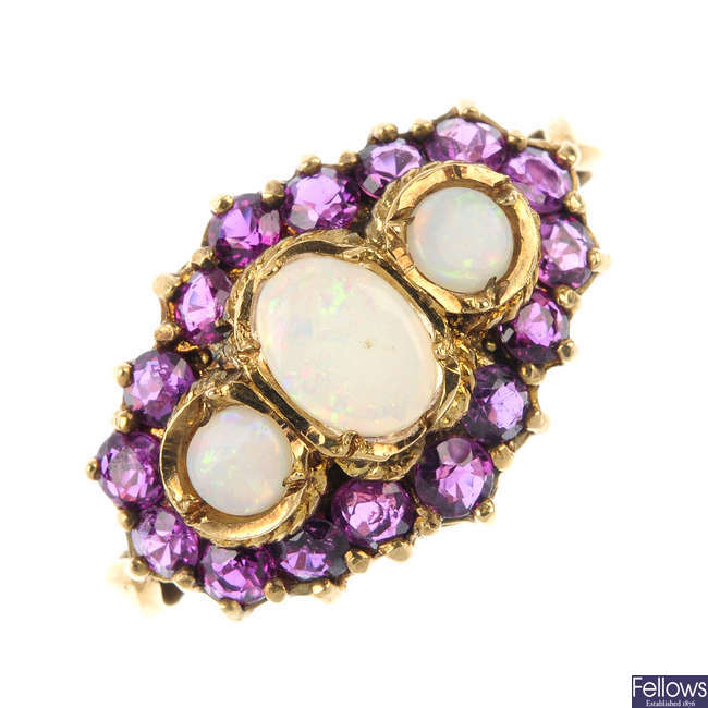 A 9ct gold opal and ruby cluster ring.