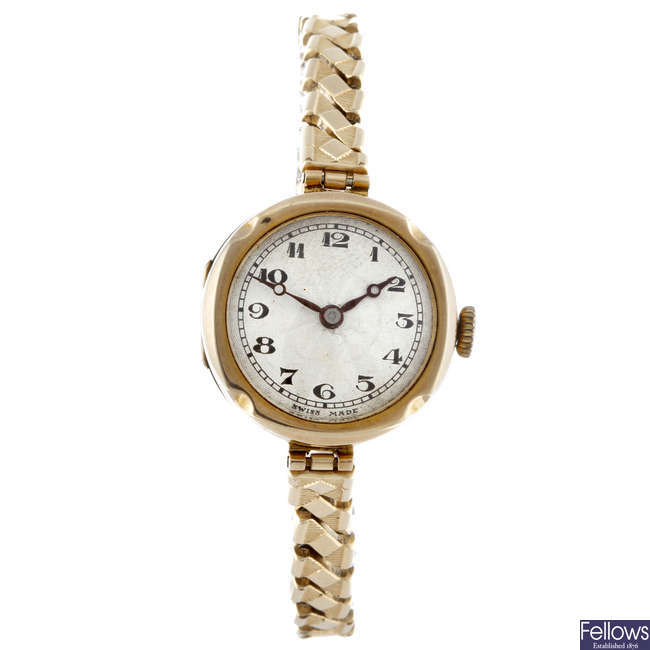 A lady's 9ct yellow gold bracelet watch with a gold plated lady's bracelet watch.