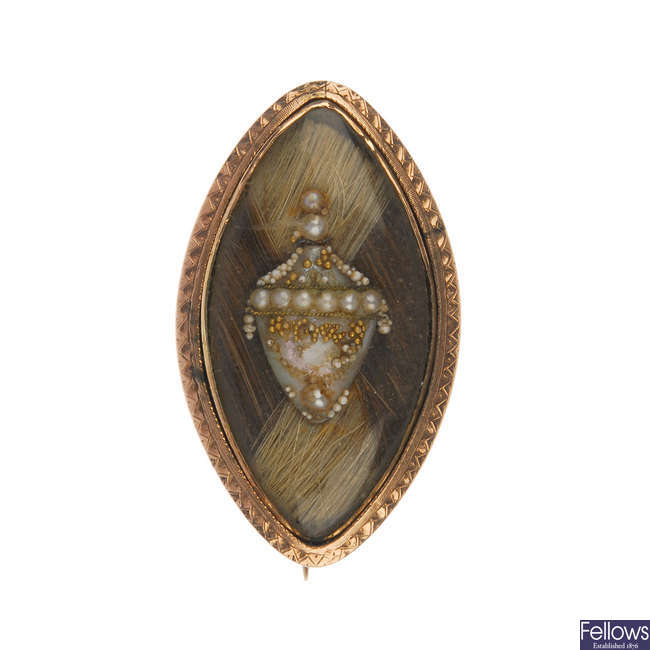 A George III gold memorial brooch.