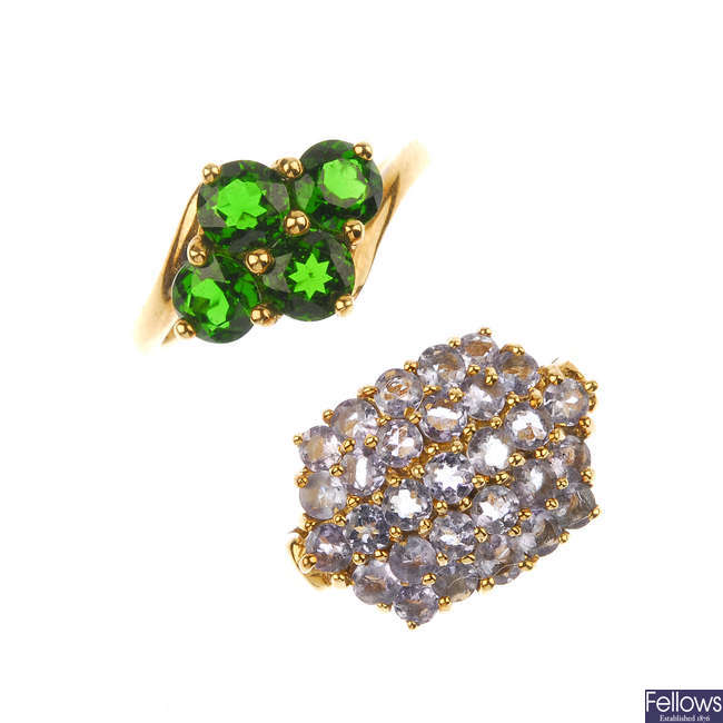 A selection of four 9ct gold gem-set rings.
