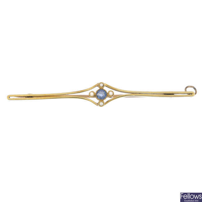 An early 20th century 15ct gold sapphire and split pearl brooch.