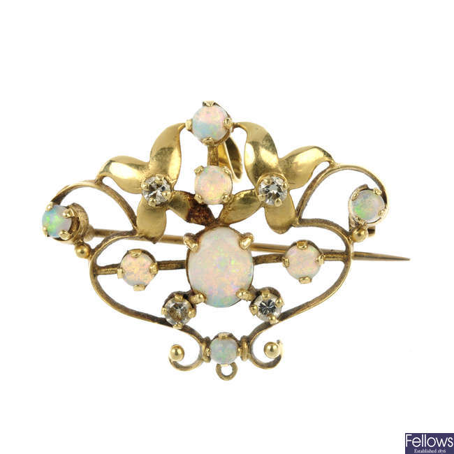 A 1970s 18ct gold opal and diamond pendant.