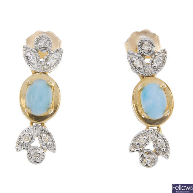 A pair of larimar and diamond ear pendants.