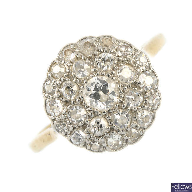 A mid 20th century 18ct gold diamond cluster ring.
