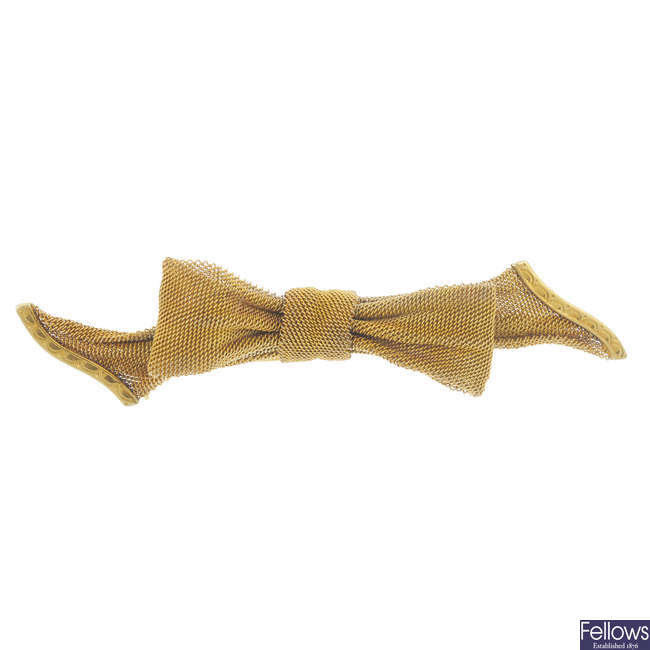 A mid 20th century 15ct gold bow brooch.