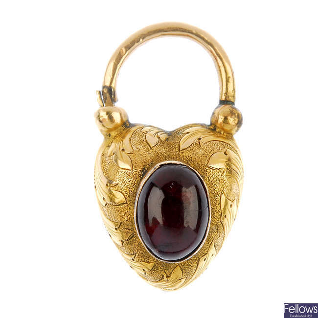 A mid 19th century 18ct gold garnet padlock clasp.