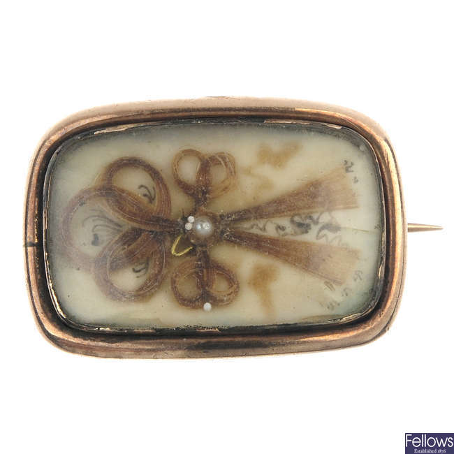 An early 19th century gold mourning brooch