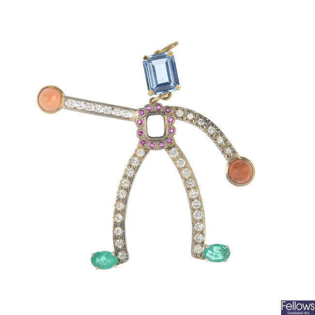 A gem-set novelty pendant.