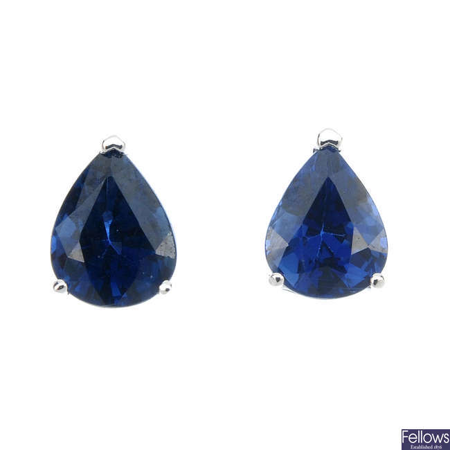 A pair of pear-shape sapphire single-stone ear studs.