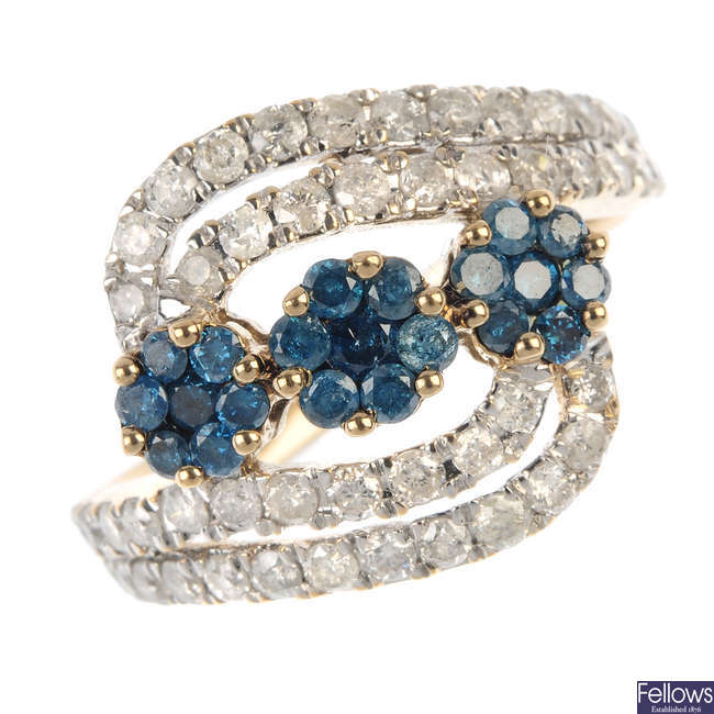 A 9ct gold colour treated 'blue' diamond and diamond crossover ring.